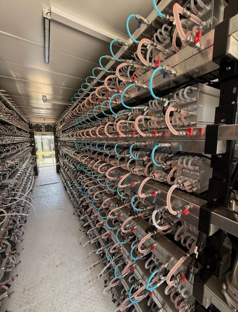 Hydro ASIC racks with visible coolant piping