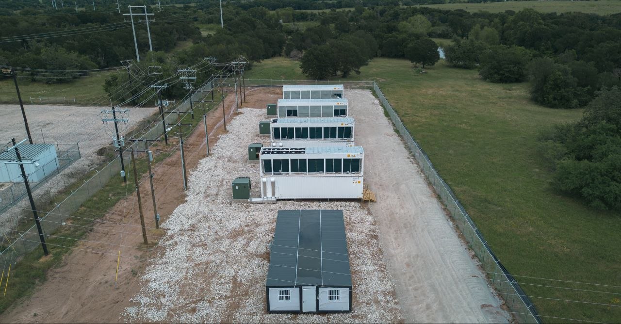 Hydro mining containers on gravel pad